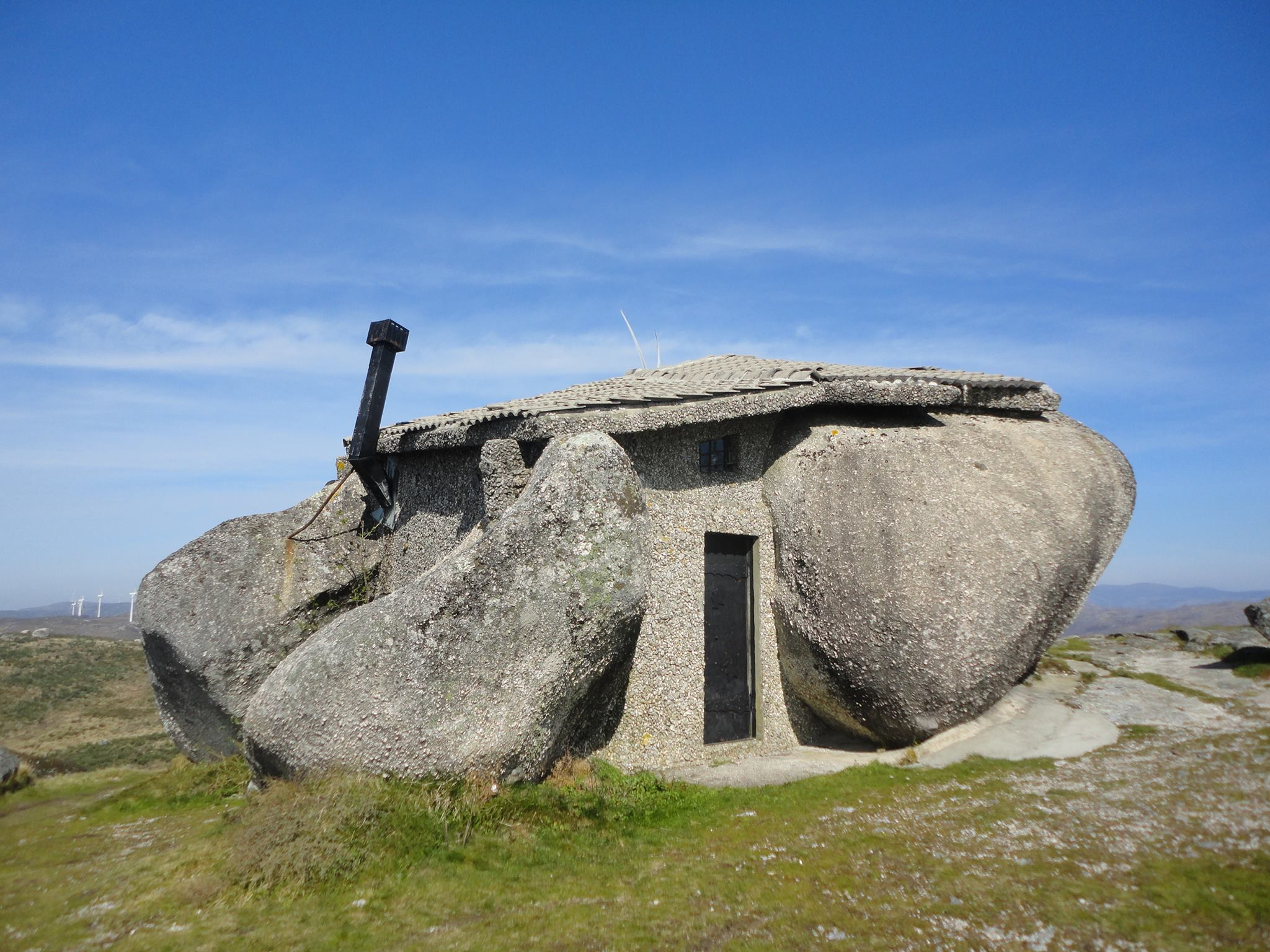 The amazing real-life Flintstones house, hewn from multiple boulders in the 1970s