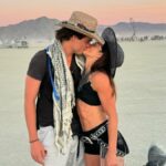 Danica Patrick Creates a Fever on Social Media When Wearing Many Bold Bikinis at Burning Man and Introducing Her New Boyfriend.